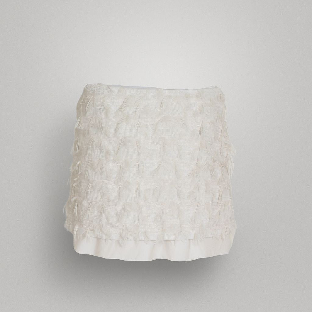 Jupe courte en dentelle blanche